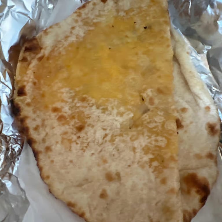 Savor our authentic naan